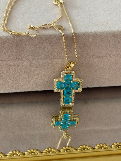 Colgante cruz turquesa baño en oro 18k