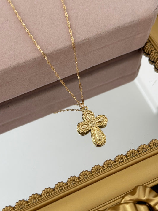 Cruz 3D con baño de oro 18k